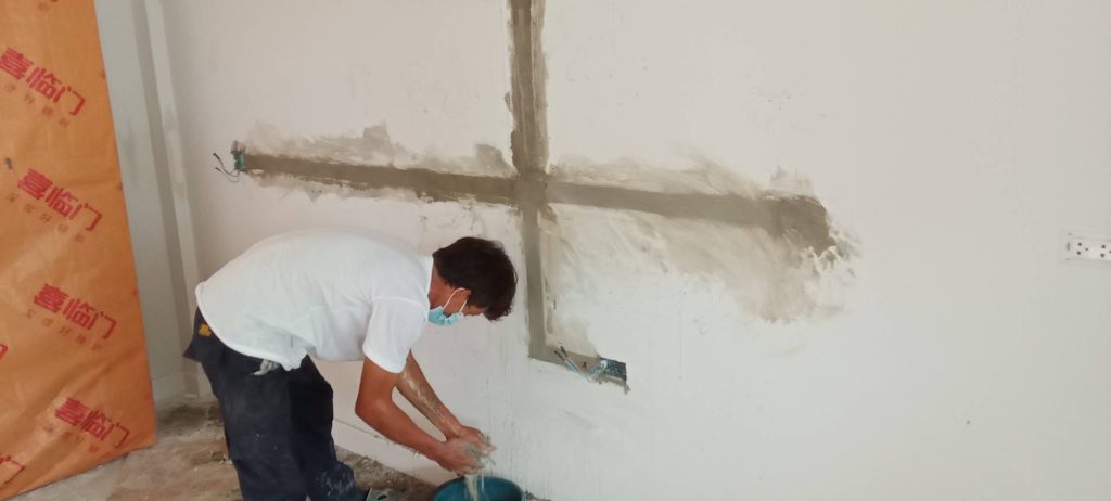 กรีดผนังฝังสายไฟ