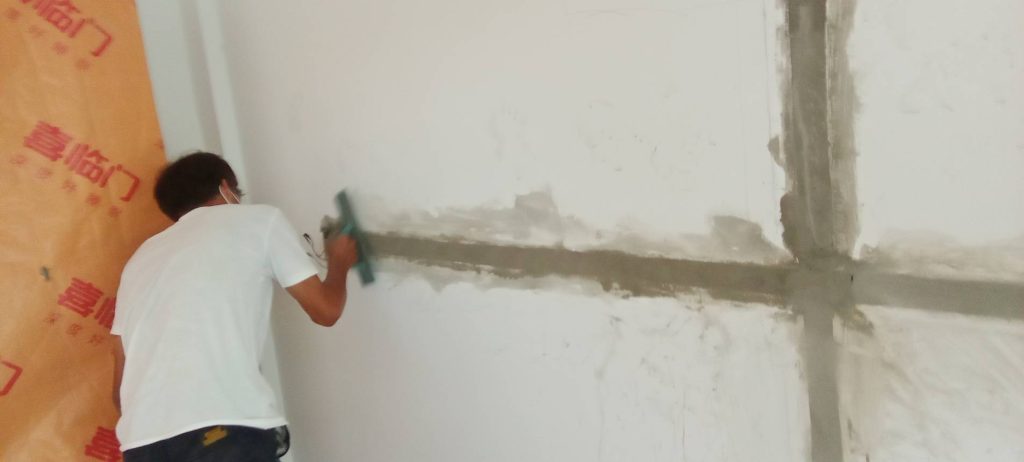 กรีดผนังฝังสายไฟ